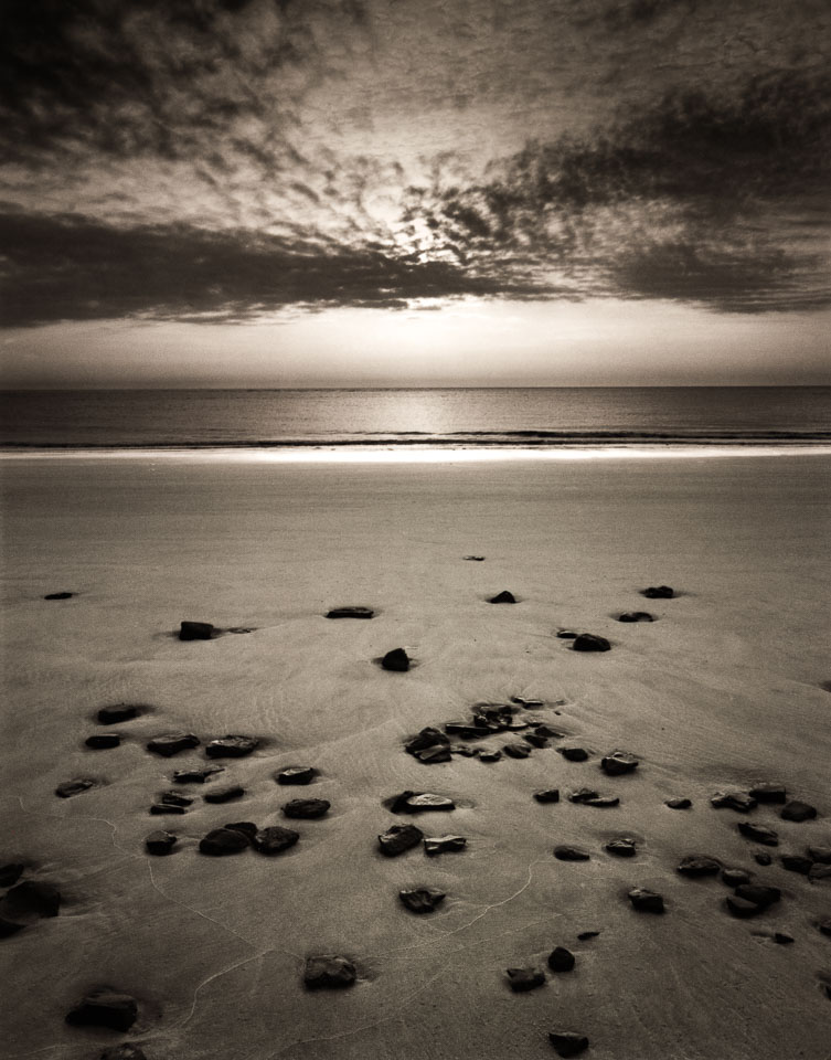 black-stones-on-beach.jpg